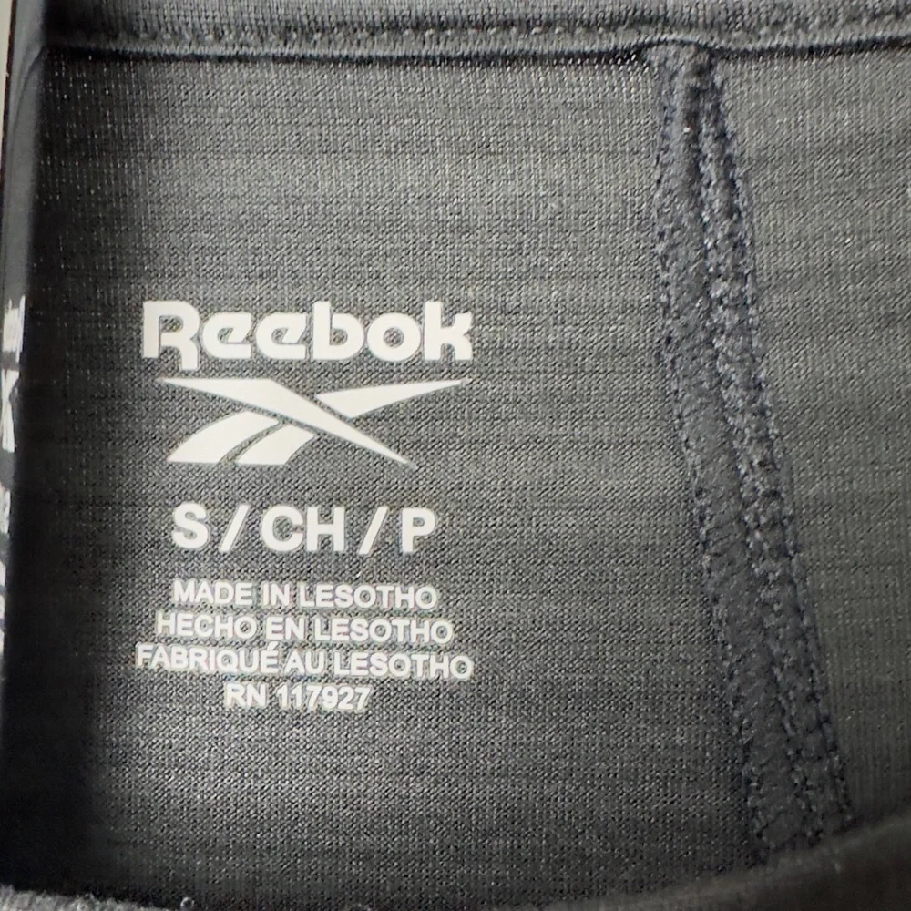 Reebok women’s small slim fit black athletic shirt​